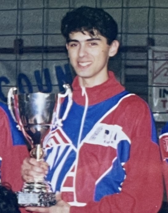 Marco Valentini with a volleyball trophy